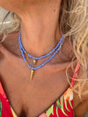 Goupi -  Blue and white necklace shell **