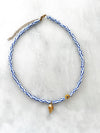 Goupi -  Blue and white necklace shell **